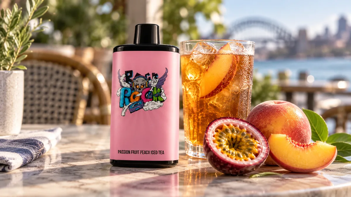 Pink IGET Bar Pro Passion Fruit Peach Iced Tea model beside peach passion fruit and tea